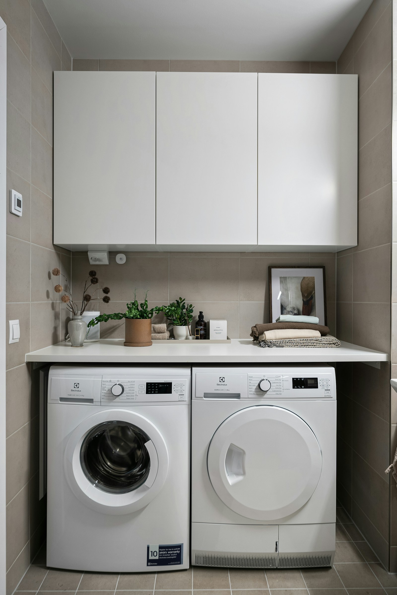Washer and dryer in a laundry room